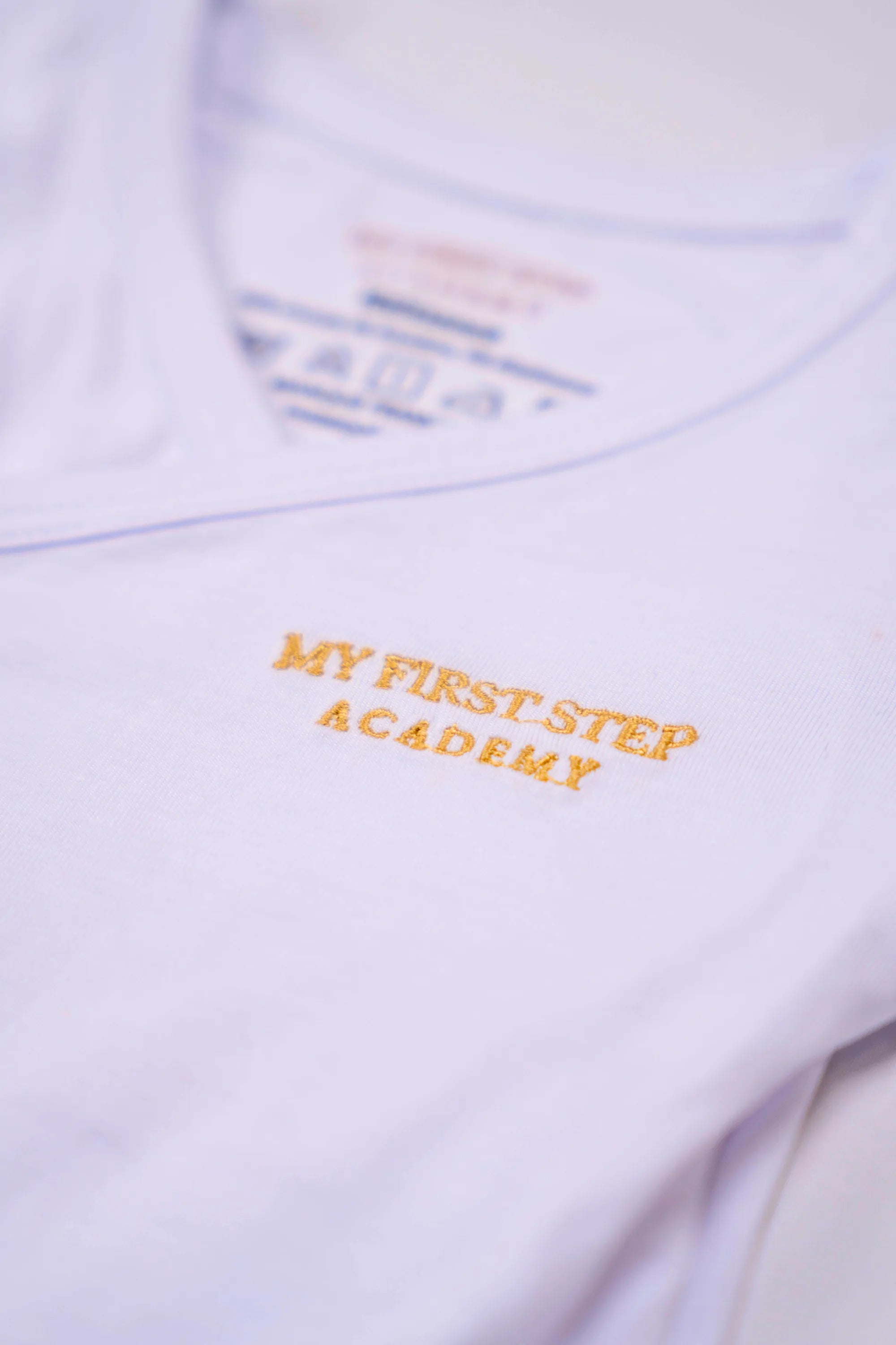 Bodies Blanc Neige avec logo My First Step Academy.